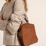 Cognac suede backpack.