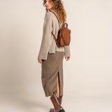 Cognac suede backpack.