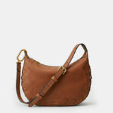 Schultertasche aus cognacfarbenem Veloursleder.