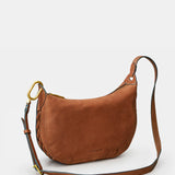 Schultertasche aus cognacfarbenem Veloursleder.
