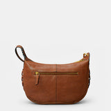 Schultertasche aus cognacfarbenem Veloursleder.
