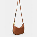 Schultertasche aus cognacfarbenem Veloursleder.