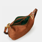 Schultertasche aus cognacfarbenem Veloursleder.