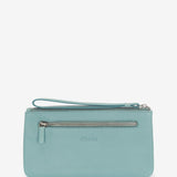 Women's leather toiletry bag with a turquoise marine print