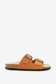 Women's flat leather sandal in cognac