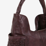 Women's leather hobo bag with braiding in brown