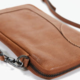 Women's leather mobile phone bag in cognac