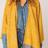 Women's poncho printed in amber