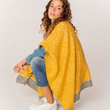 Women's poncho printed in amber