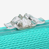 Turquoise braided clutch