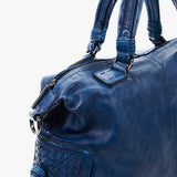 Women's leather bowling bag with braiding in blue