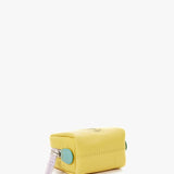 Small women's leather toiletry bag with yellow die-cut logo