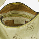 Women's handbag in green die-cut leather