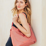 Women's hobo bag in coral die-cut leather