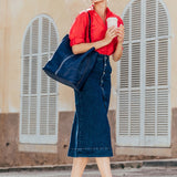 Bolso hobo de mujer con asa trenzada en piel azul
