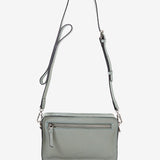 Women's mini crossbody bag in green die-cut leather