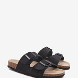 Women's flat sandal in black suede