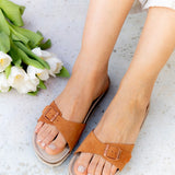 Women's flat buckle sandal in cognac