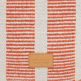 Small raffia basket with white and orange striped print