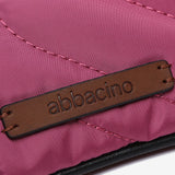 Toiletry bag in recycled materials and fuchsia padding