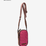 Handytasche aus recycelten und gepolsterten Materialien in Fuchsia.