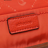 Orange recycled material shoulder bag