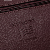 Bandolera en materiales reciclados burdeos