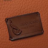 Shoulder bag in cognac recycled materials