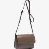 Small patent leather crossbody bag in taupe