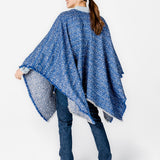 Poncho con estampado a rayas en azul