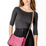 Crossbody bag in recycled and padded fuchsia materials