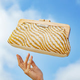 Clutch de fiesta animal print en camel