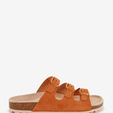 Women's flat leather sandal with triple buckle in cognac