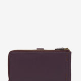 Large wallet with stitching in purple leather