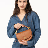 Half moon shoulder bag in cognac recycled materials