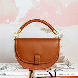 Half moon shoulder bag in cognac recycled materials