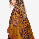 Poncho con estampado de pata de gallo en ámbar