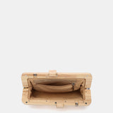Clutch de fiesta a rayas en amarillo
