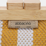 Clutch de fiesta a rayas en amarillo