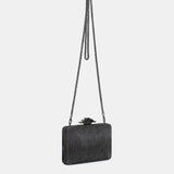 Clutch en terciopelo plateado