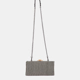 Clutch de fiesta a rayas negro