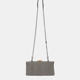 Clutch de fiesta a rayas negro