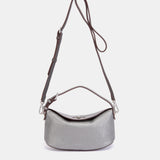 Bolso de mano en plateado