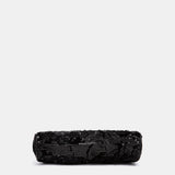 Schwarze Party-Paillettenhandtasche.