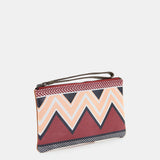 Neceser de mujer con print geométrico en burdeos