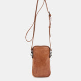 Mobile phone bag in cognac die-cut leather