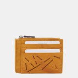 Tarjetero-monedero de mujer en piel troquelada amarilla