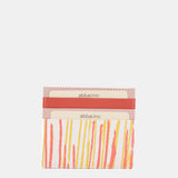 Tarjetero en piel con estampado en coral