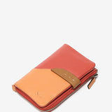 Medium leather wallet in coral tones