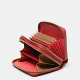 Cartera pequeña en piel en tonos coral